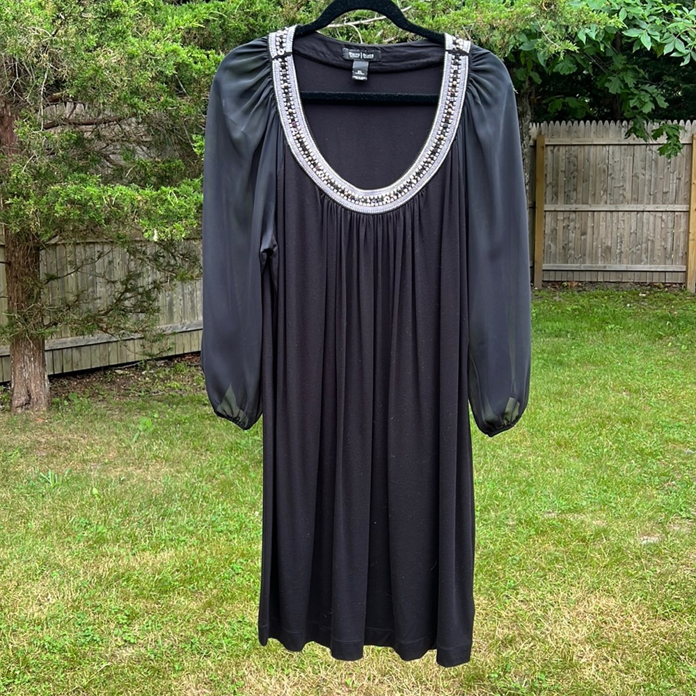 Black shift dress with sheer puffy sleeves